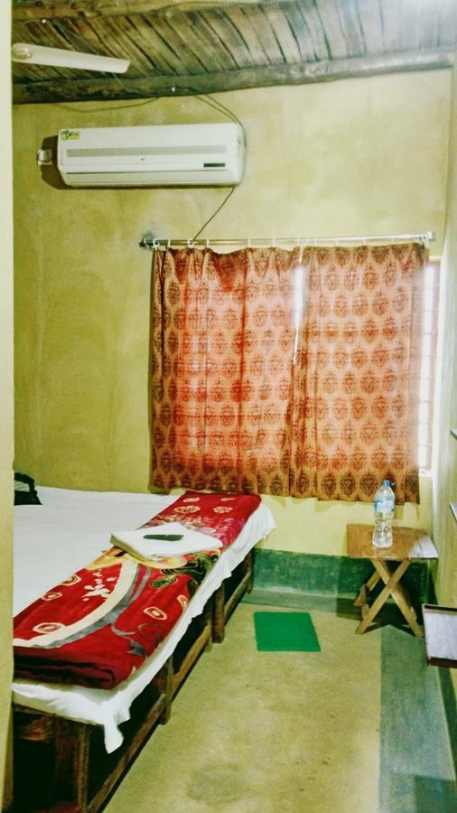 Roshnai Village Resort Bolpur Quarto foto